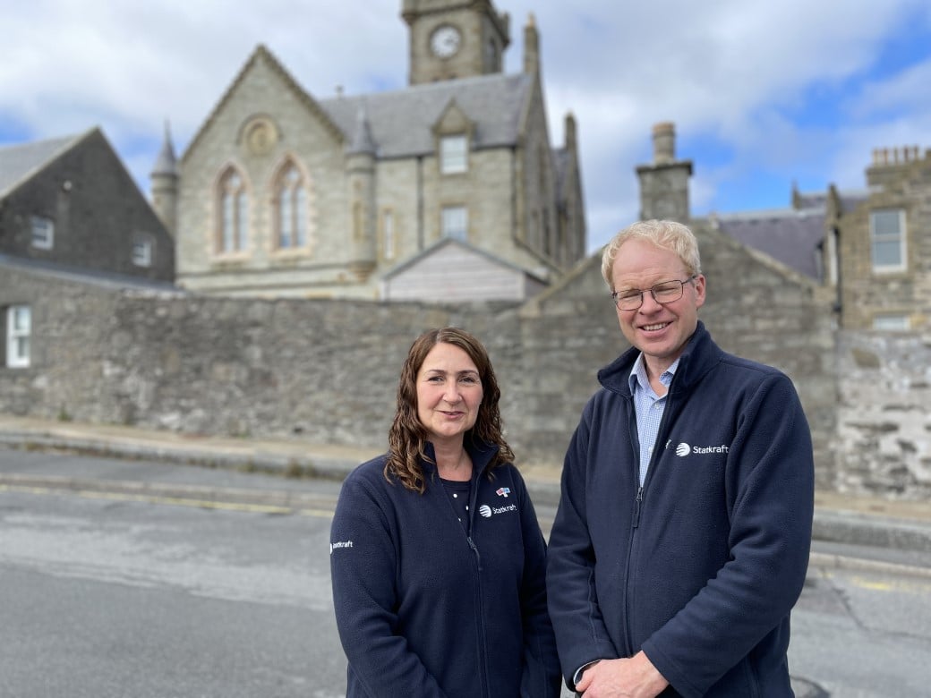 Tracey Leslie and John Thouless stand outside Lerwick Town House