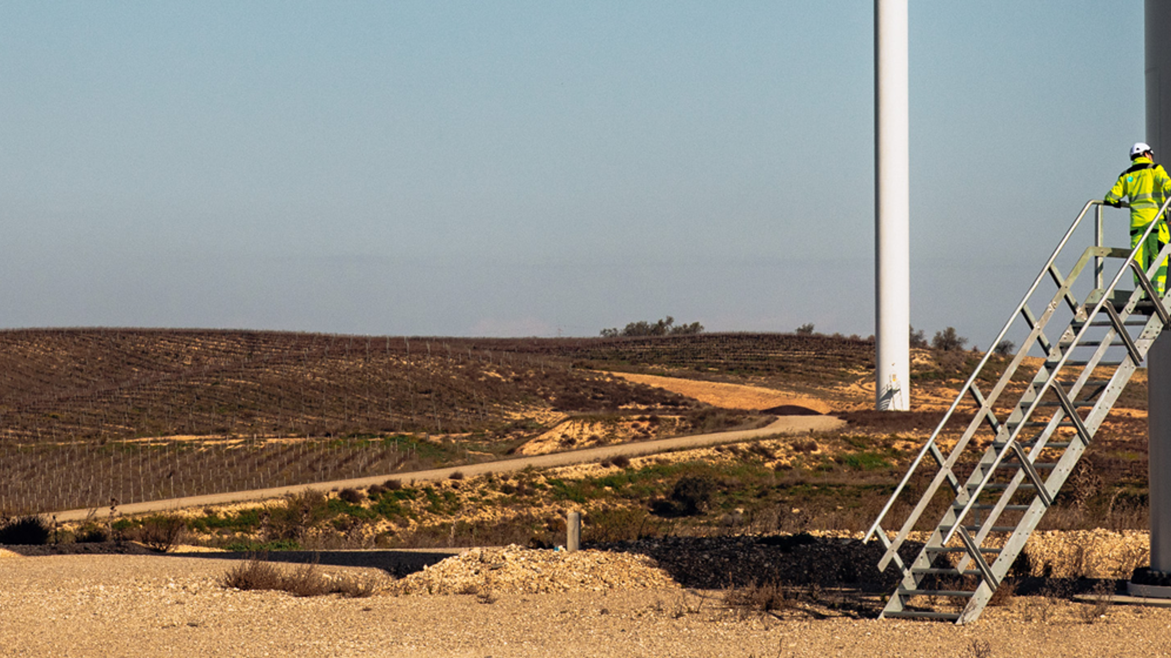 A wind turbine photographed from near its base